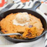 Pumpkin mini skillet cookie with spoonful to front