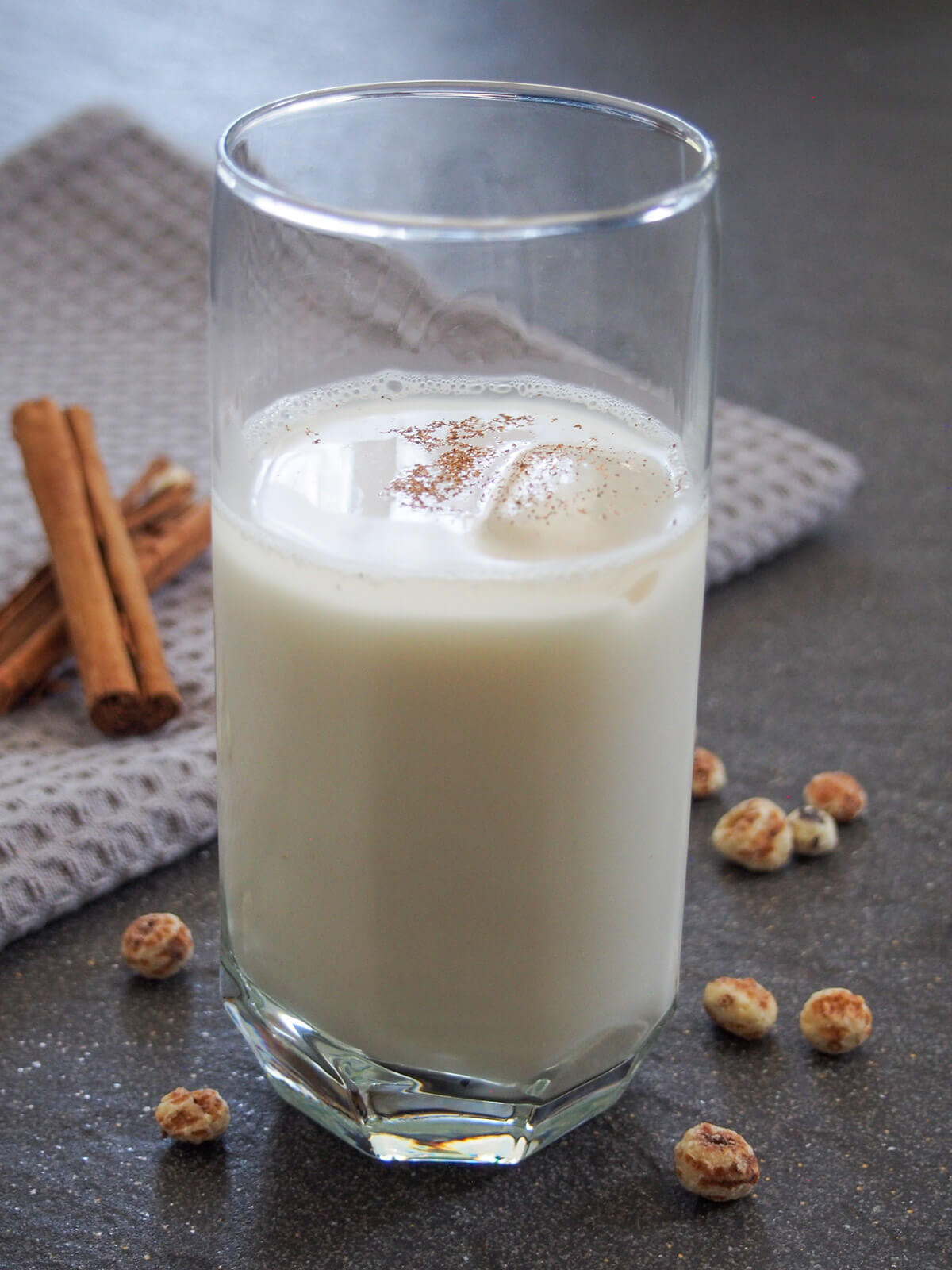 Spanish horchata de chufa made with tiger nuts is gluten free and dairy free, not to mention refreshing and delicious. Perfect for a hot day. glass of Spanish horchata
