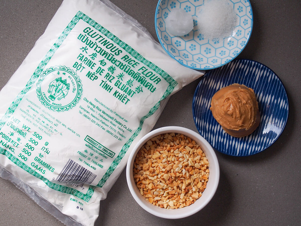 ingredients for dumplings - glutinous rice flour, peanuts, peanut butter, sugar and coconut oil