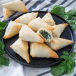 plate of spanakopita triangles