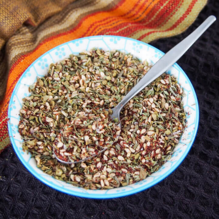 bowl of za'atar spice blend with spoon in it