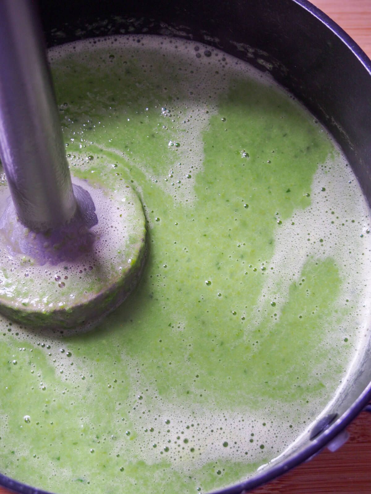 stick blender in pot of soup