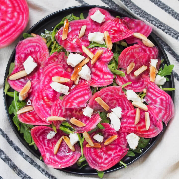 overhead view of plate of chioggia beet salad