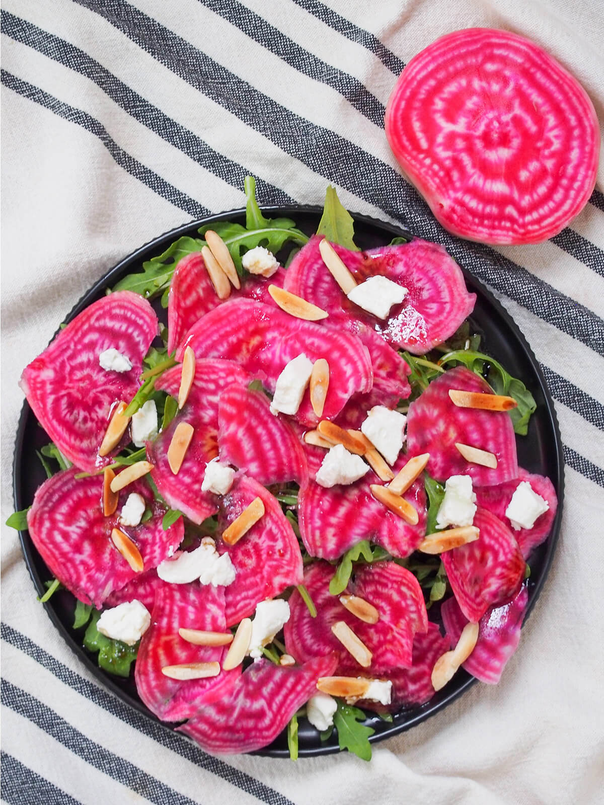 plate of chioggia beet salad with beet above plate from overhead