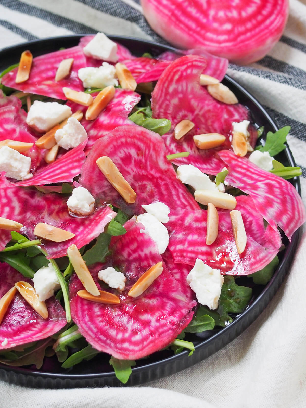 side view of chioggia beet salad