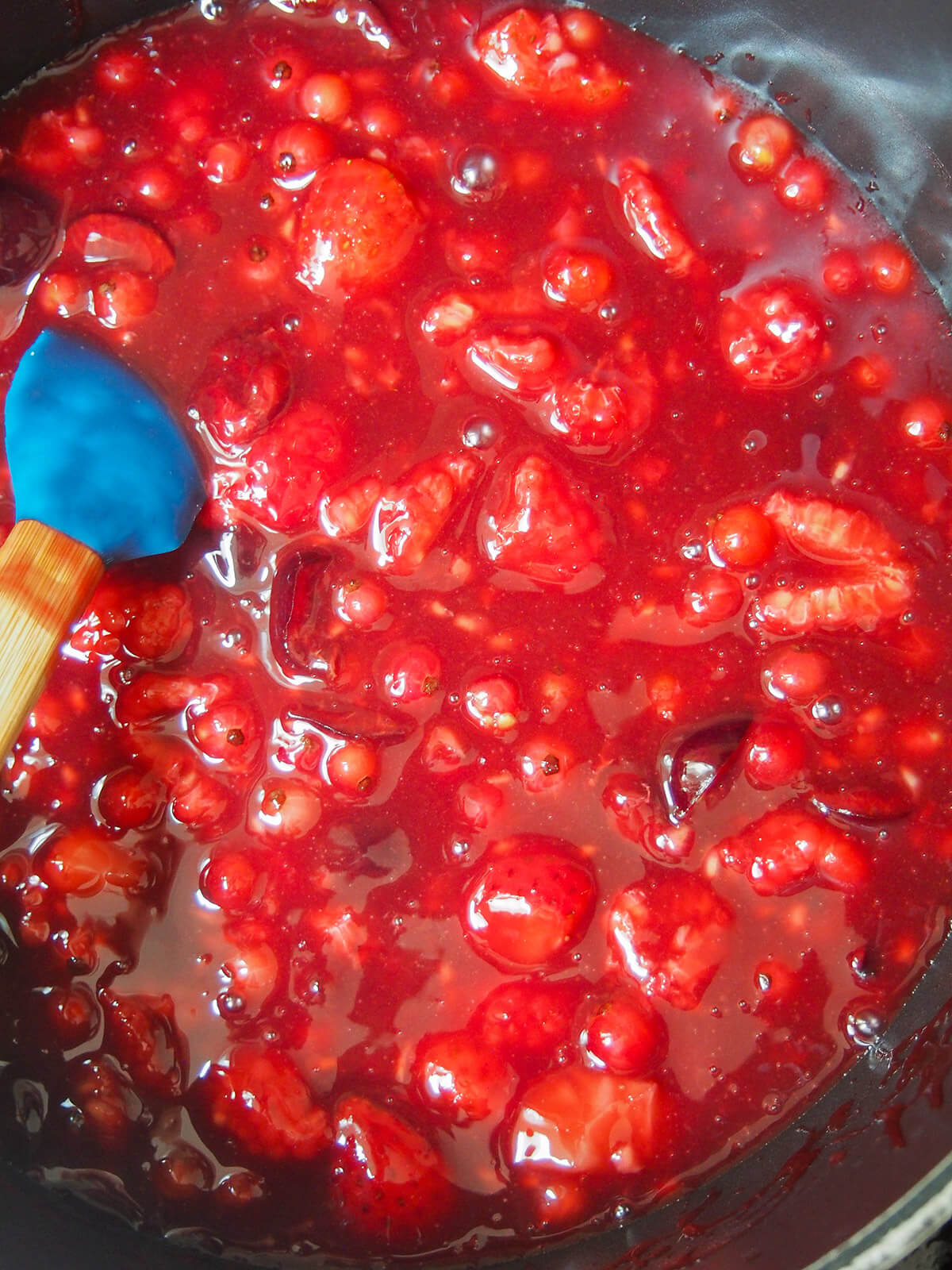 stirring fruit sauce mixture