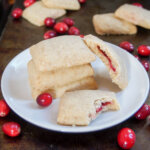 plate of cranberry jam filled shortbread cookies
