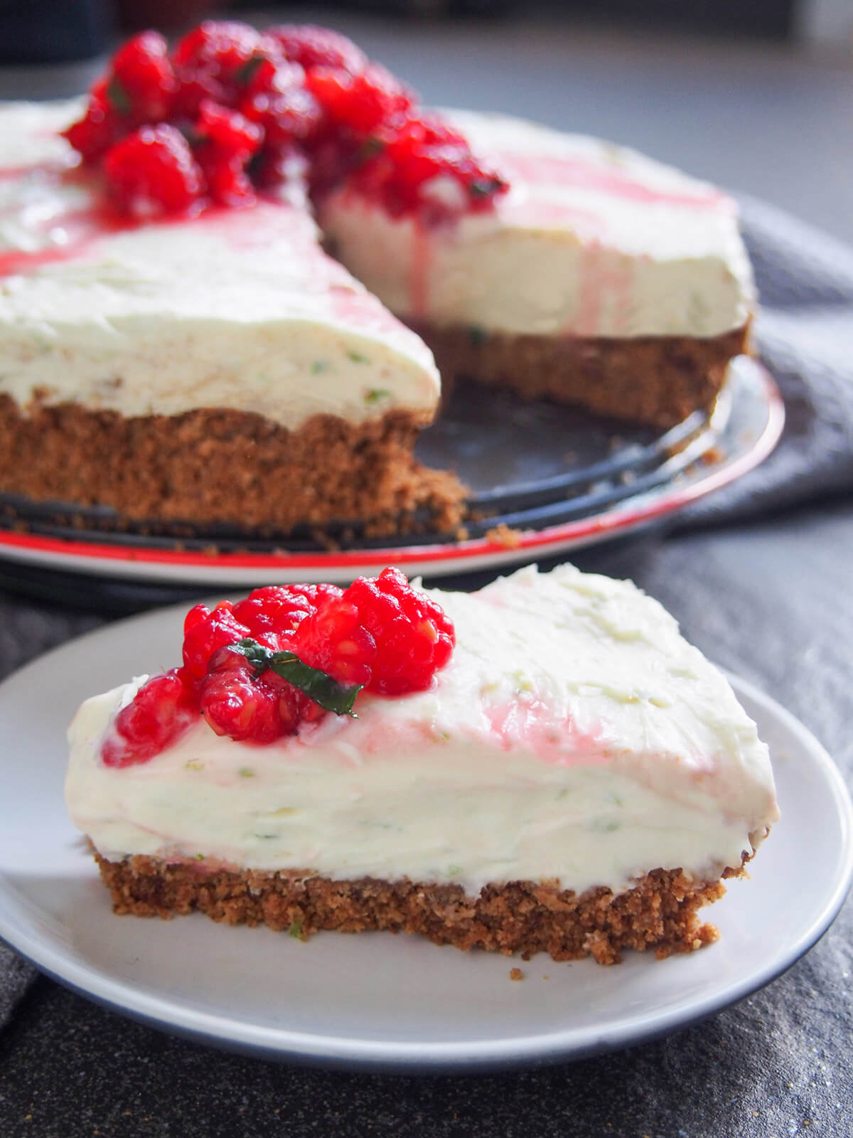 slice of lime mascarpone cheesecake with rest behind