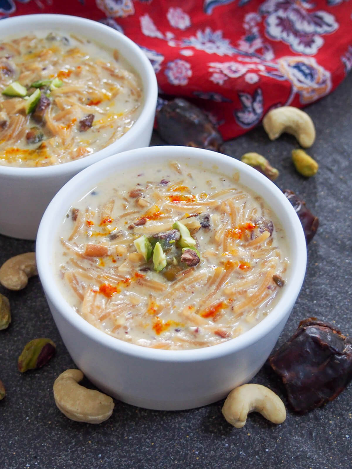 bowl of sheer khurma and part view of second bowl behind