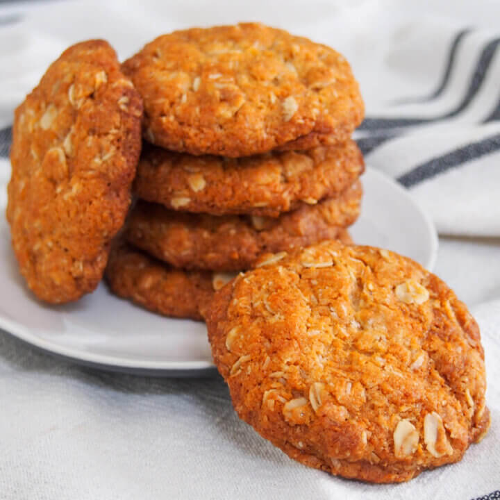 stack of Anzac biscuits with one in front