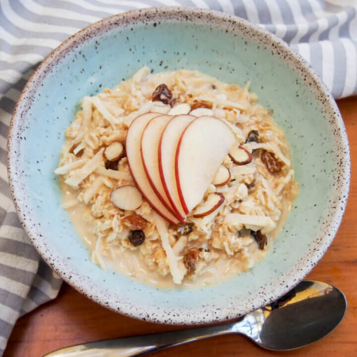 bowl of Swiss Bircher muesli with spoon in front