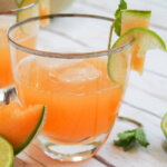 glass of cantaloupe agua fresca from side