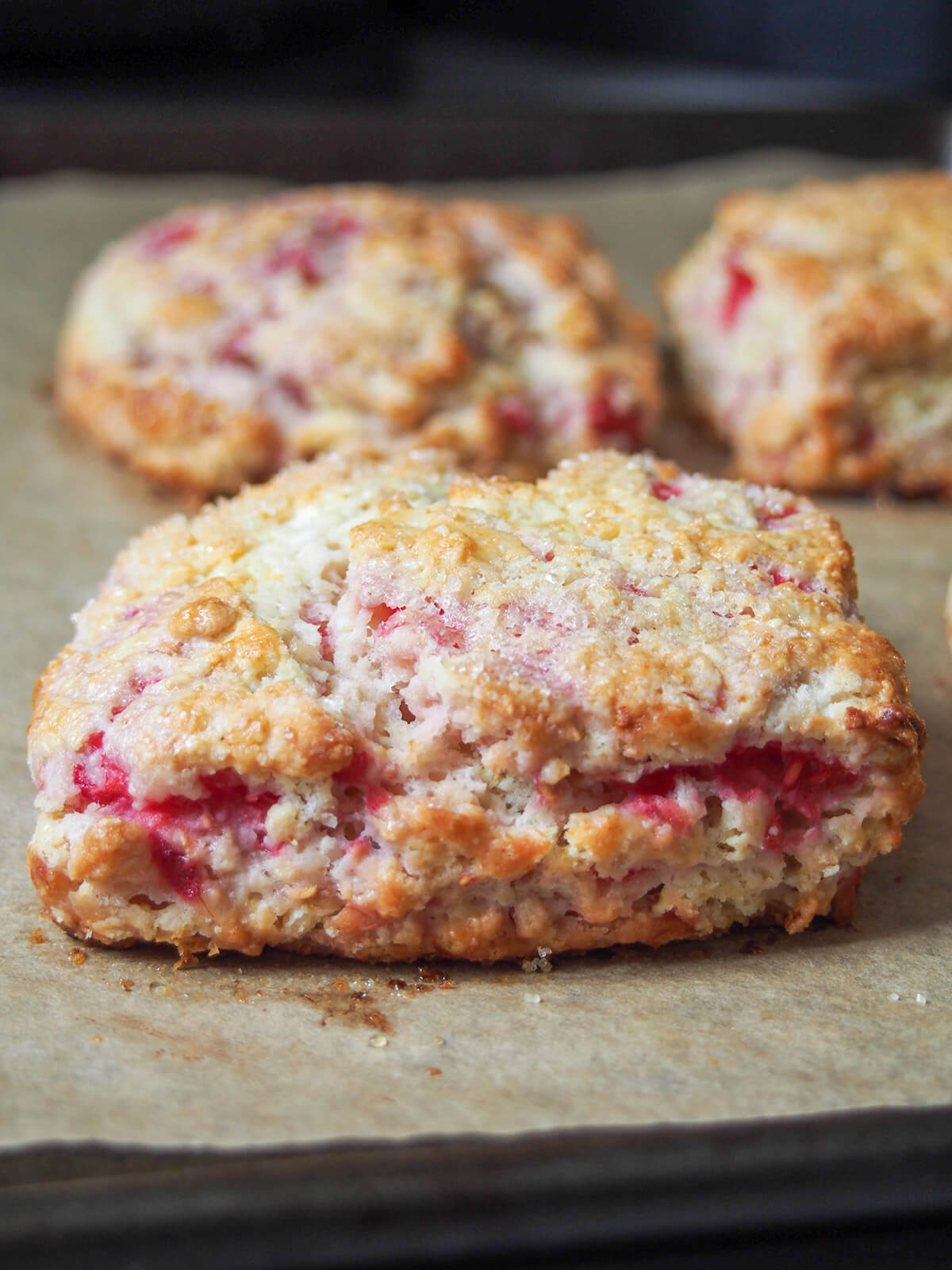 raspberry scones on baking sheet after baking