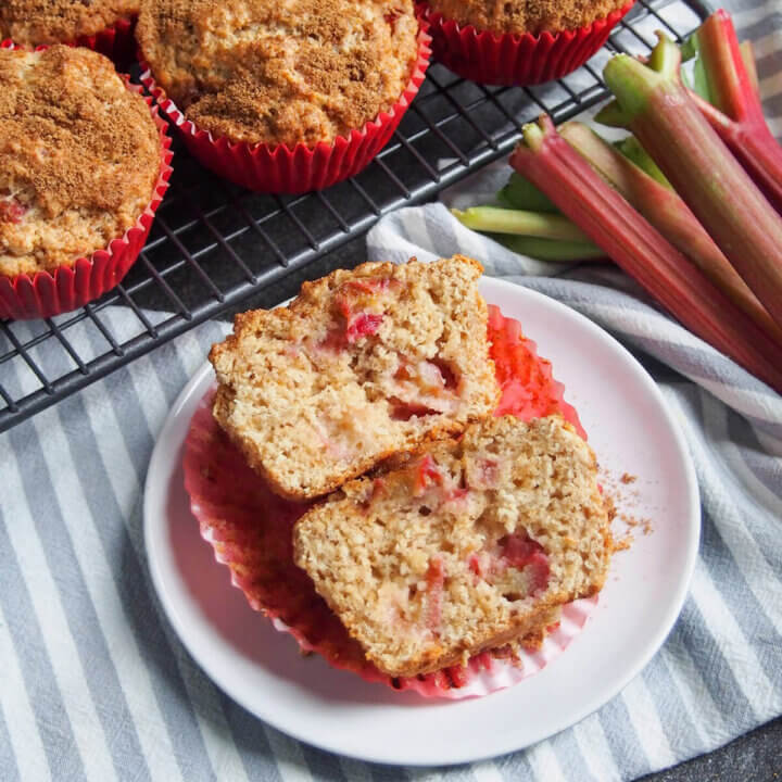 rhubarb muffin on plate with rhubarb to side