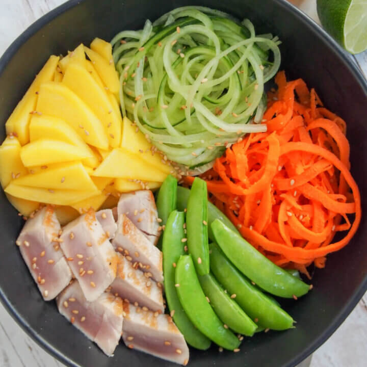 seared tuna and veggie bowl close up