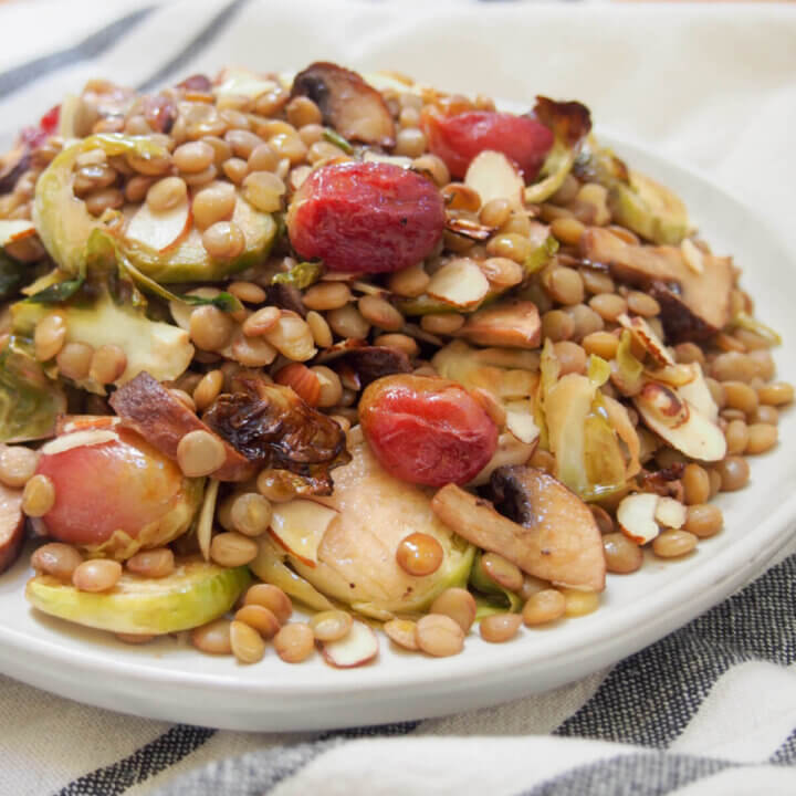 plate of vegan lentil salad with roasted Brussels sprouts