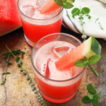 glass of watermelon coconut agua fresca with other glass behind