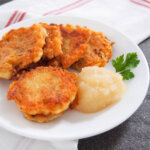 German potato pancakes with applesauce to side