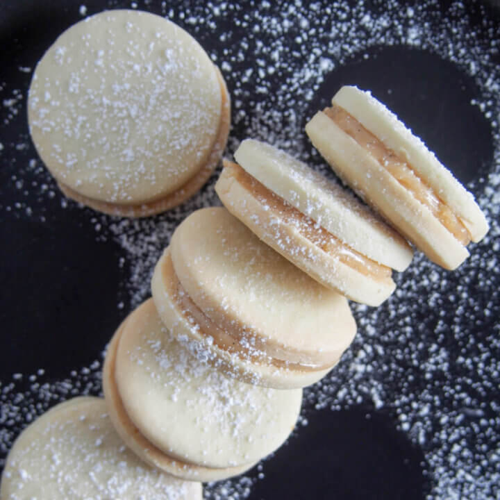Alfajores (dulce de leche sandwich cookies) stacked on end