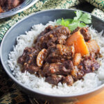 bowl of beef massaman curry over rice