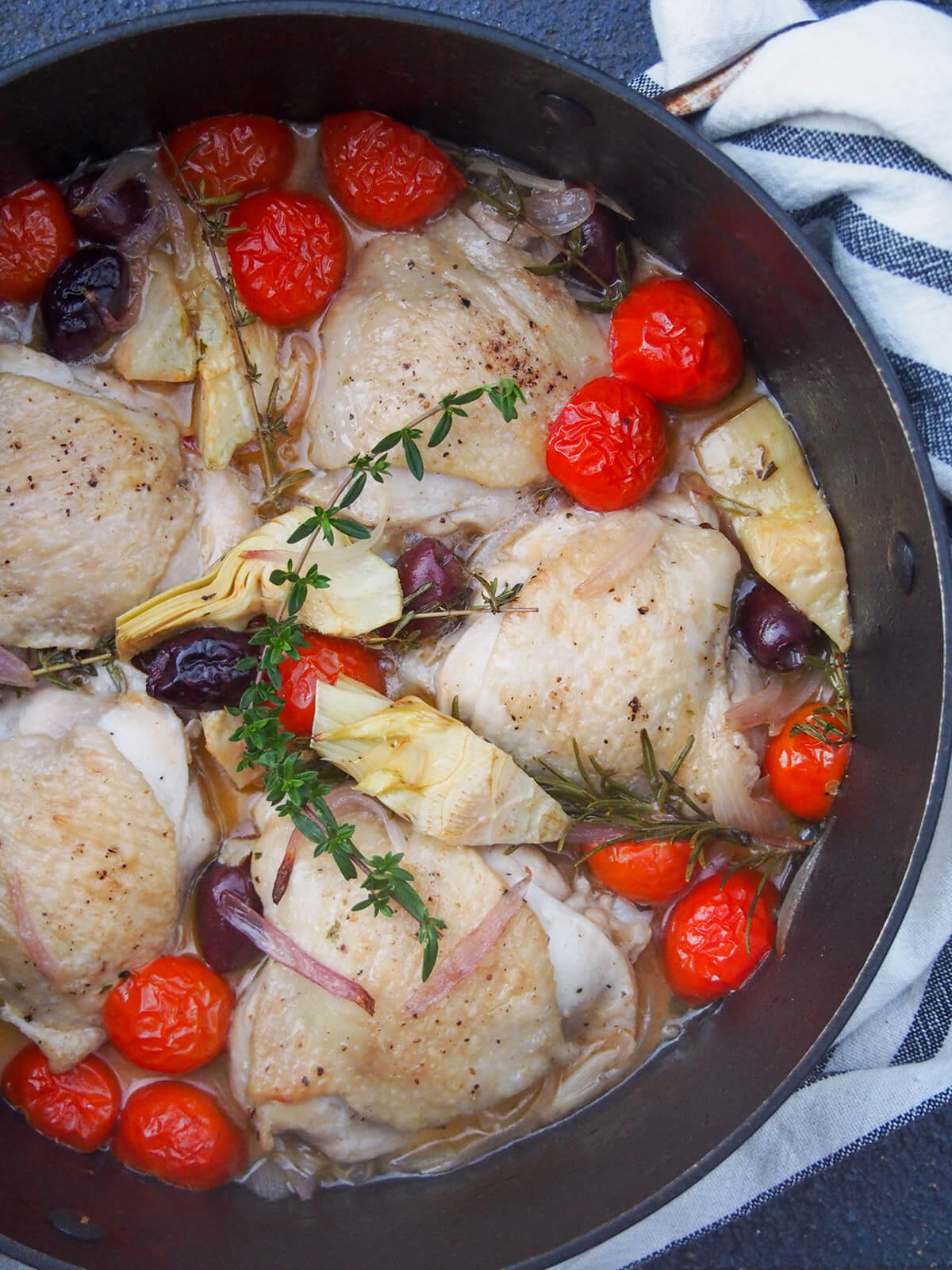 partial view of chicken provencal in dish