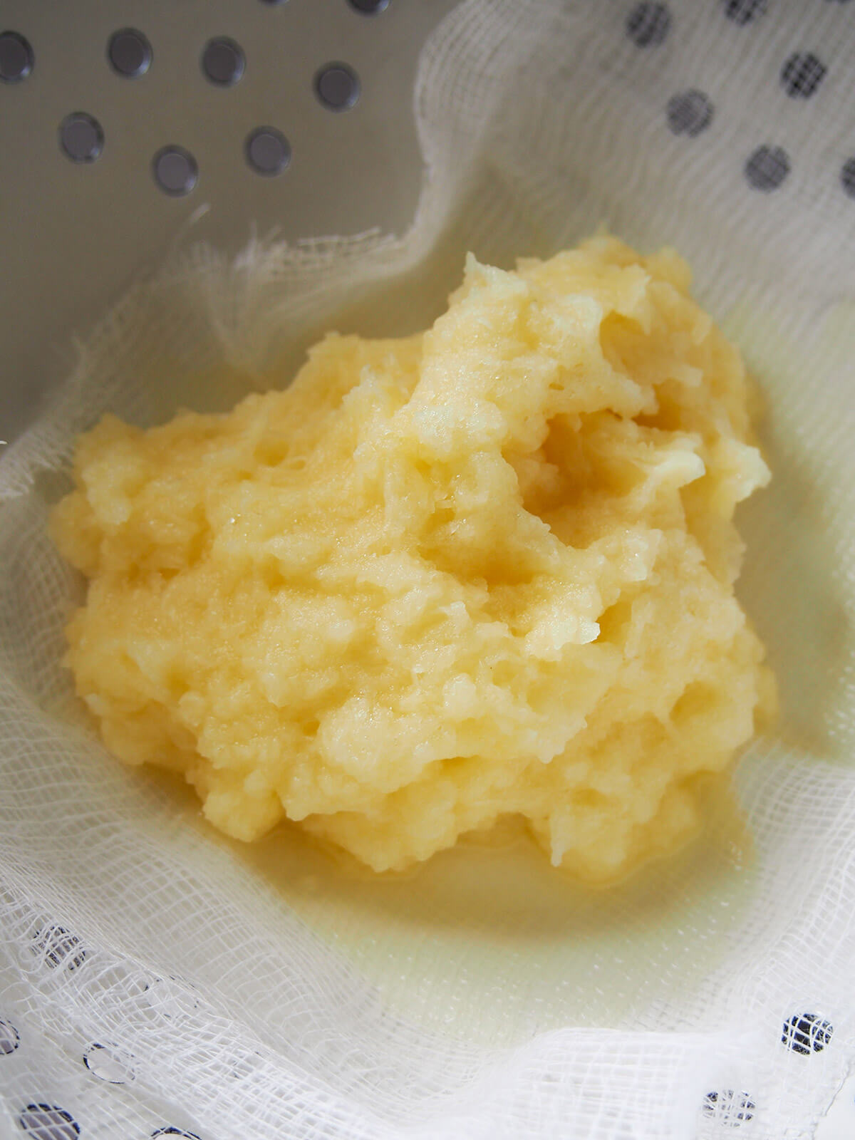 draining grated potato