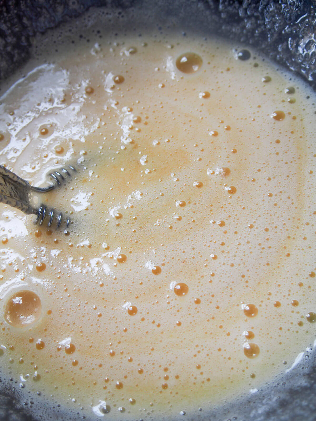 whisking eggs and sugar