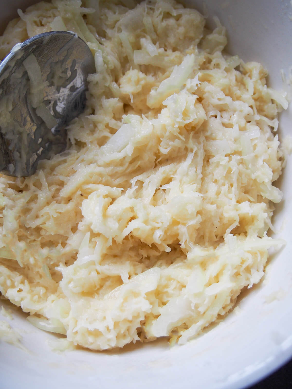potato-egg mixture in bowl