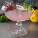 glass of rhubarb southside cocktail