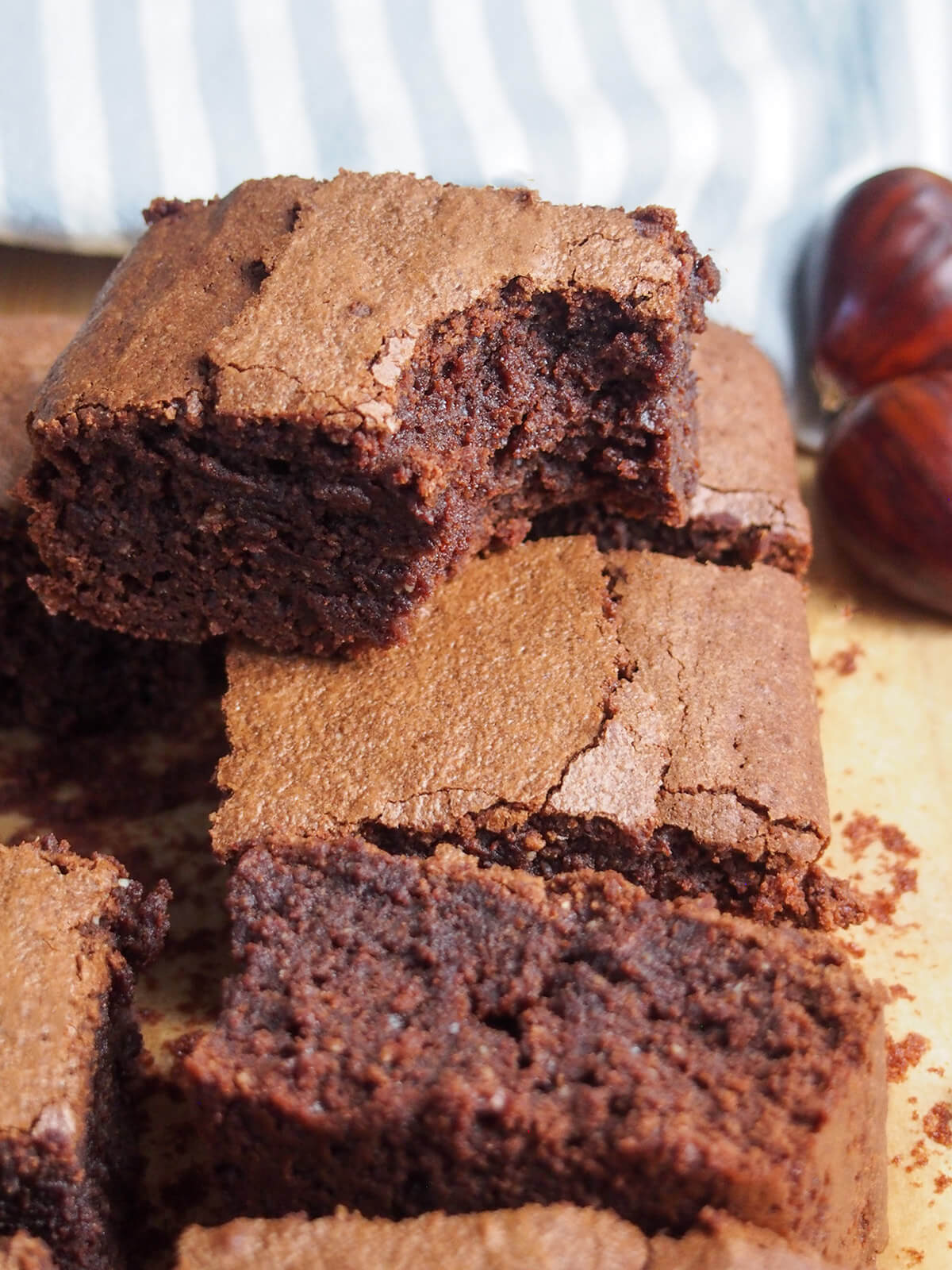 a brownie with bite out of it sitting on top of others