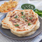 stack of peshwari naan on plate