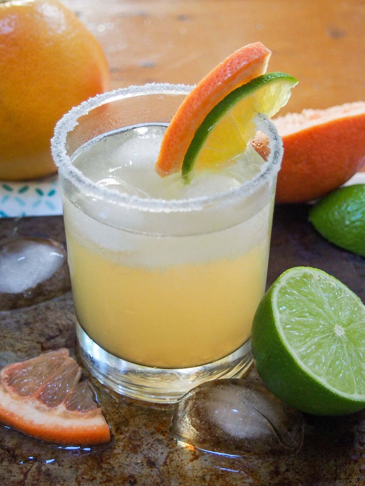 The Paloma cocktail is a wonderfully easy classic tequila-based cocktail. Made with fresh grapefruit juice gives it a bright, fresh flavor profile - a perfect balance of sweet and tart flavors, and wonderful to sip on. paloma cocktail in salt rimmed glass