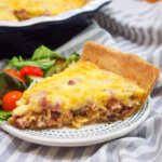 slice of quiche Lorraine on small plate