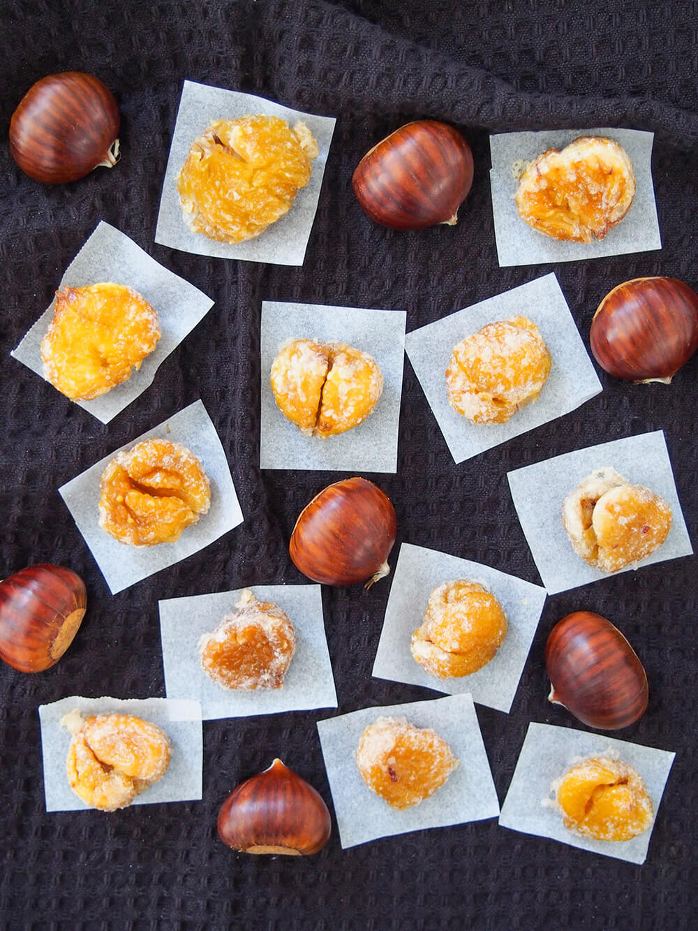 candies chestnuts with whole chestnuts in between viewed form overhead