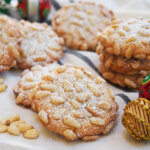 pignoli cookies dusted with powdered sugar