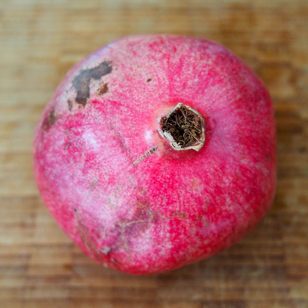 whole pomegranate on board