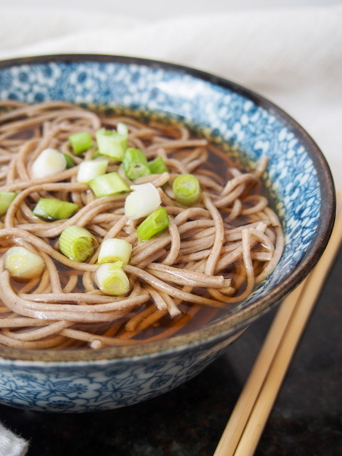 side view of bowl of toshikoshi soba noodles