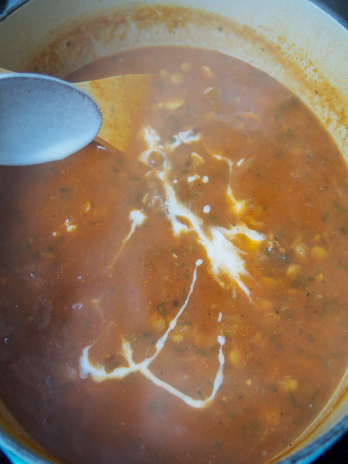 adding flour paste to soup