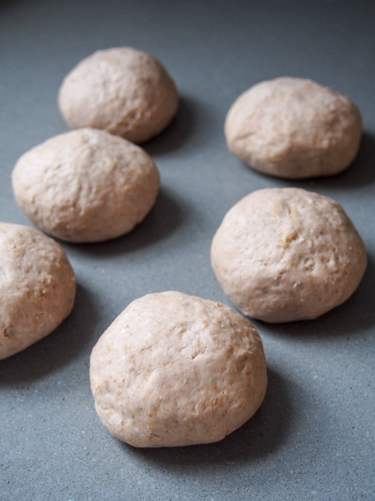 balls of bread dough on work surface