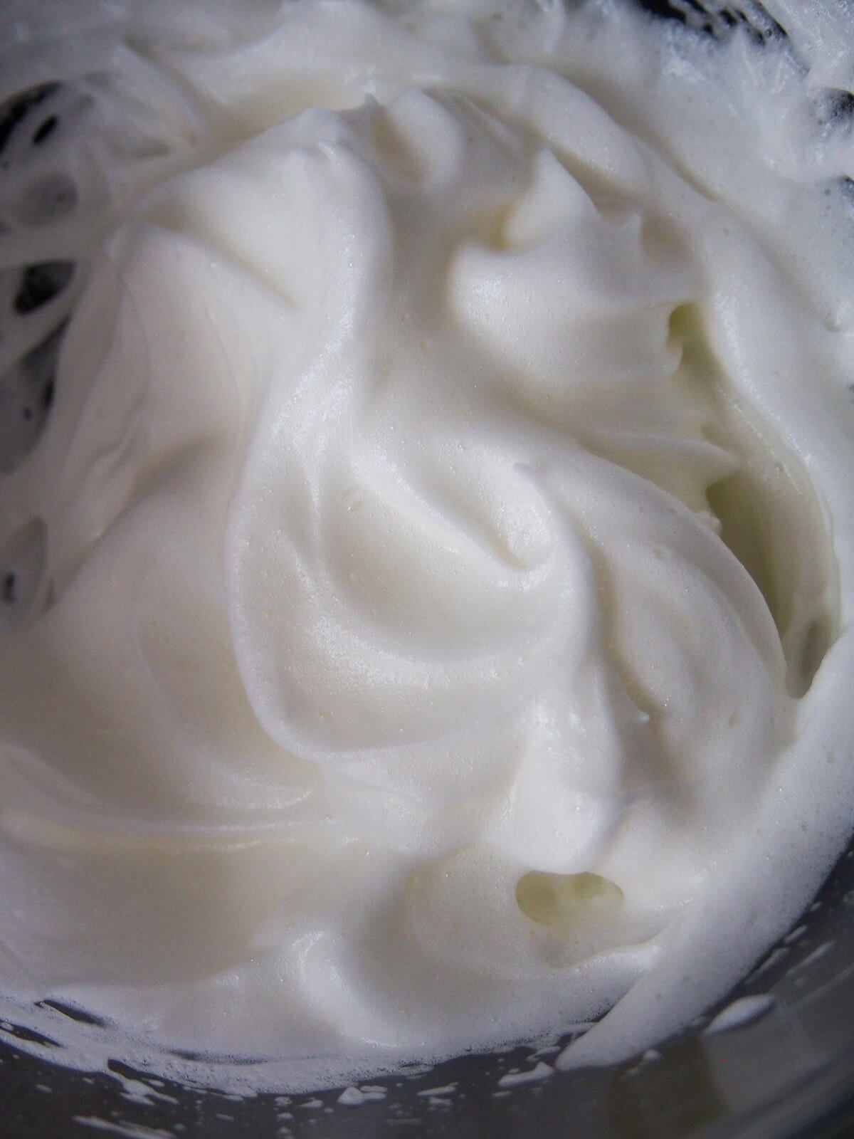 beaten egg white in bowl