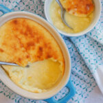 dish of lemon pudding cake with part view of bowl above