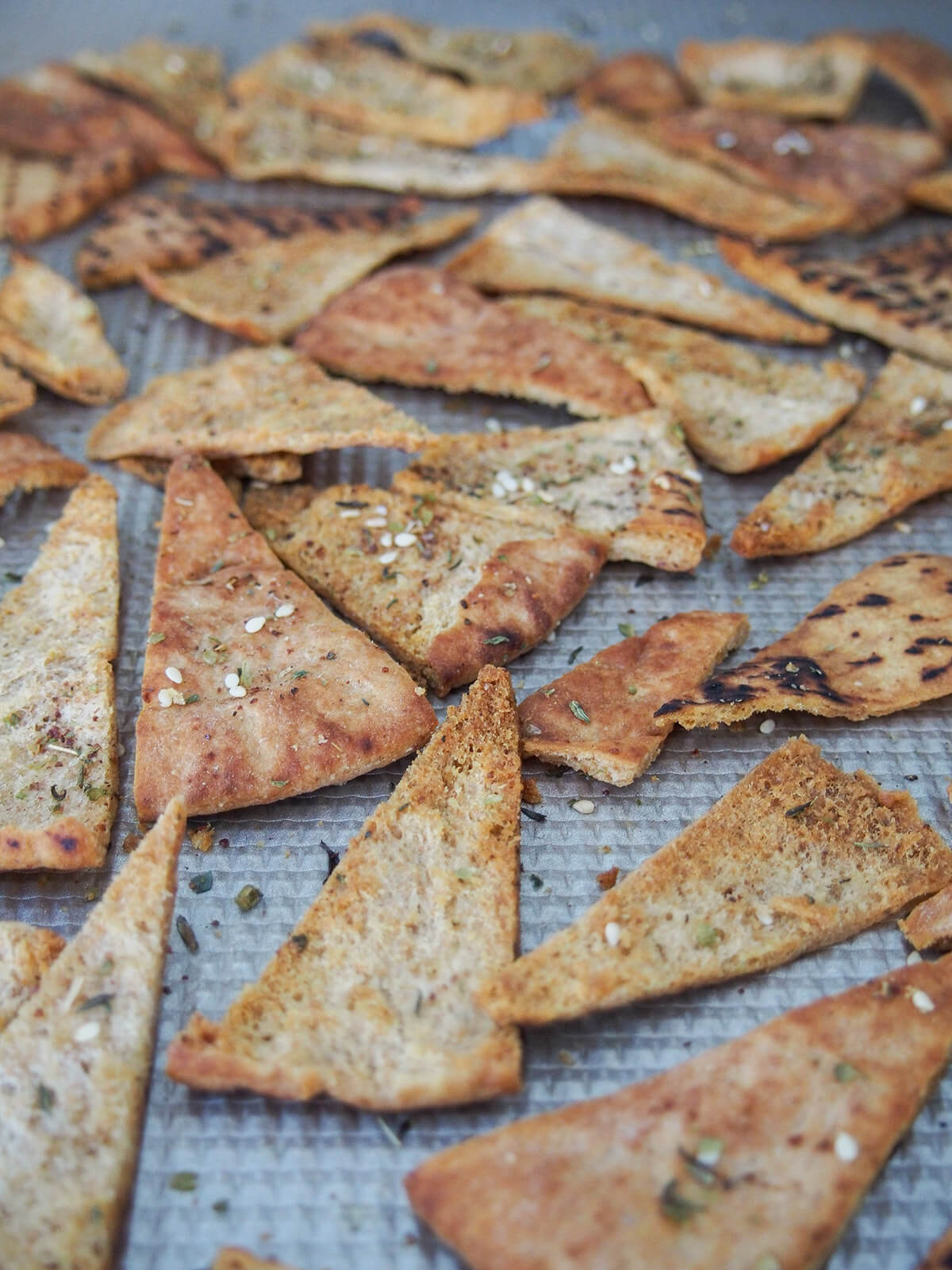 baked pita chips on baking sheet out oven