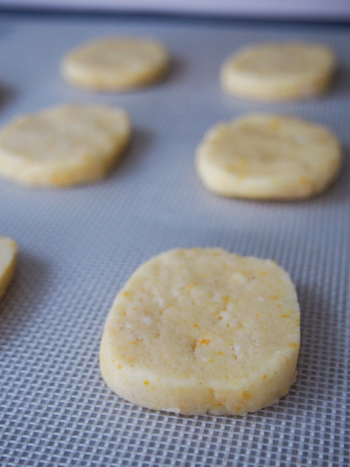 unbaked cookies on baking sheet