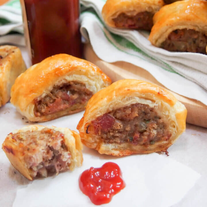 sausage rolls with ketchup in front