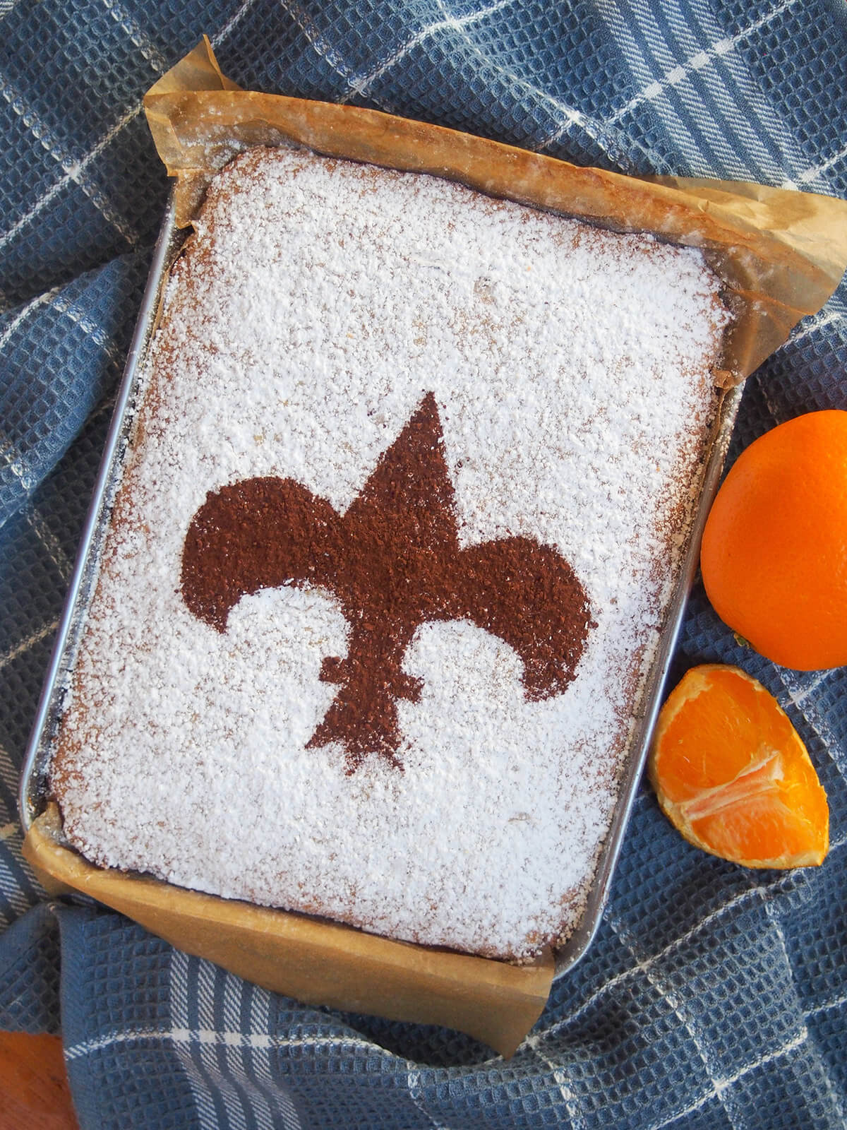 whole Florentine orange cake schiacciata with orange to side from overhead