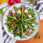 plate of asparagus salad with lemon vinaigrette from overhead