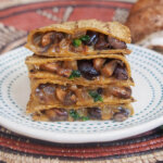 stack of mushroom quesadillas on plate