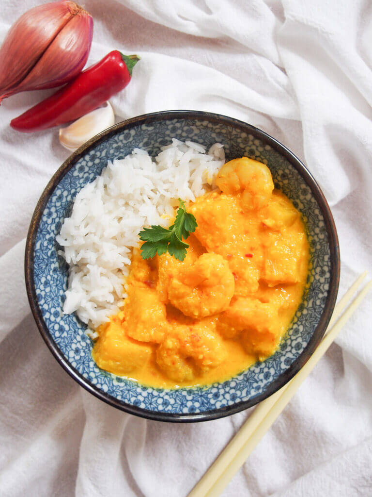 overhead view of bowl of pineapple shrimp curry