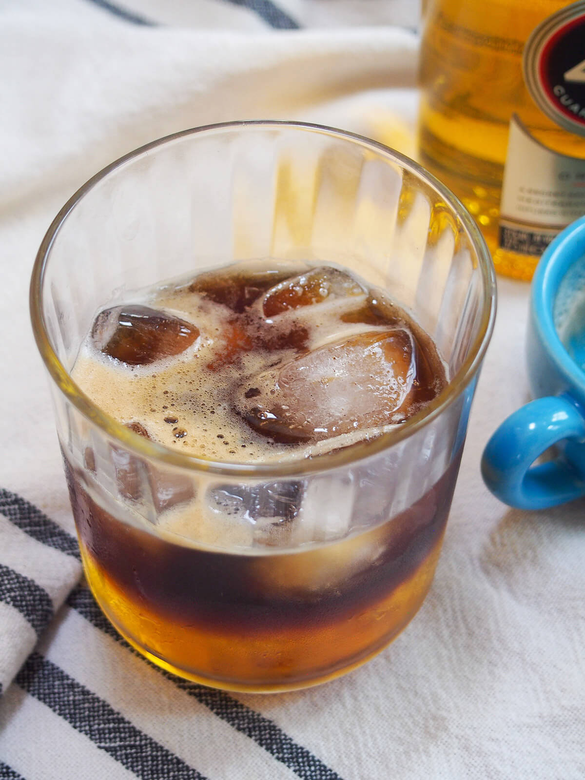 looking into glass of Mexican carajillo coffee cocktail