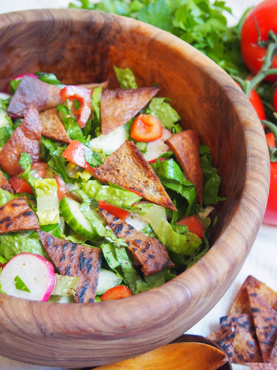 side view of fattoush salad in bowl